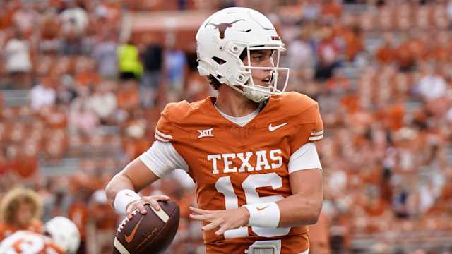 Texas Longhorns quarterback Arch Manning (16) warms up before a game against the Wyoming Cowboys at Darrell K Royal-Texas Memorial Stadium. 
